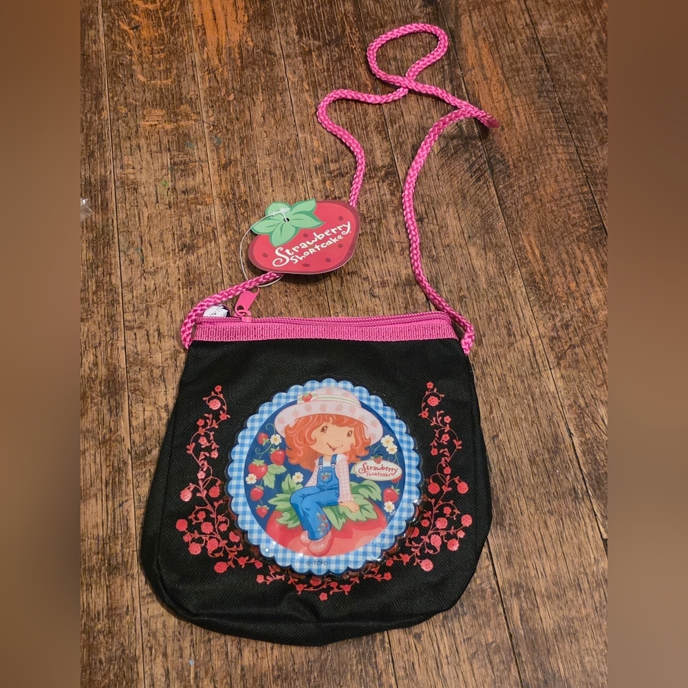 American Greetings Strawberry Shortcake Black and Pink Kids Crossbody Bag